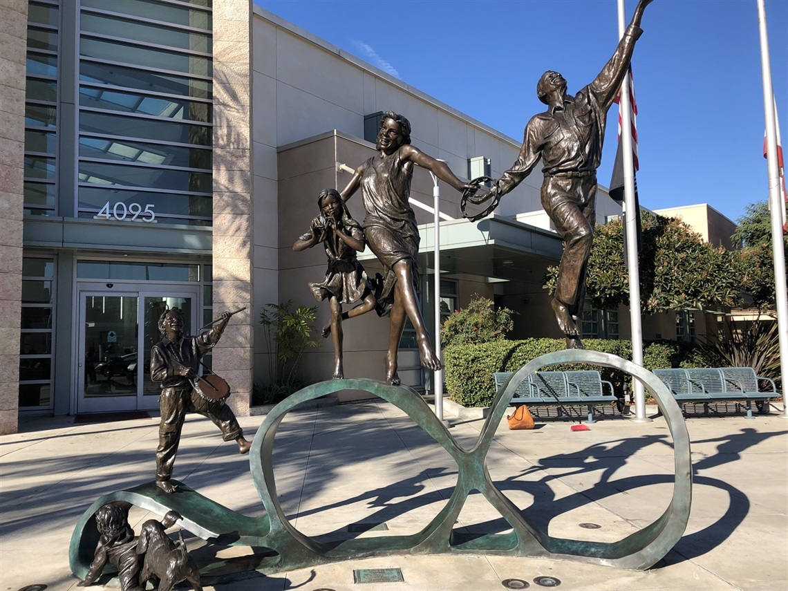 path of life artwork in front of senior center