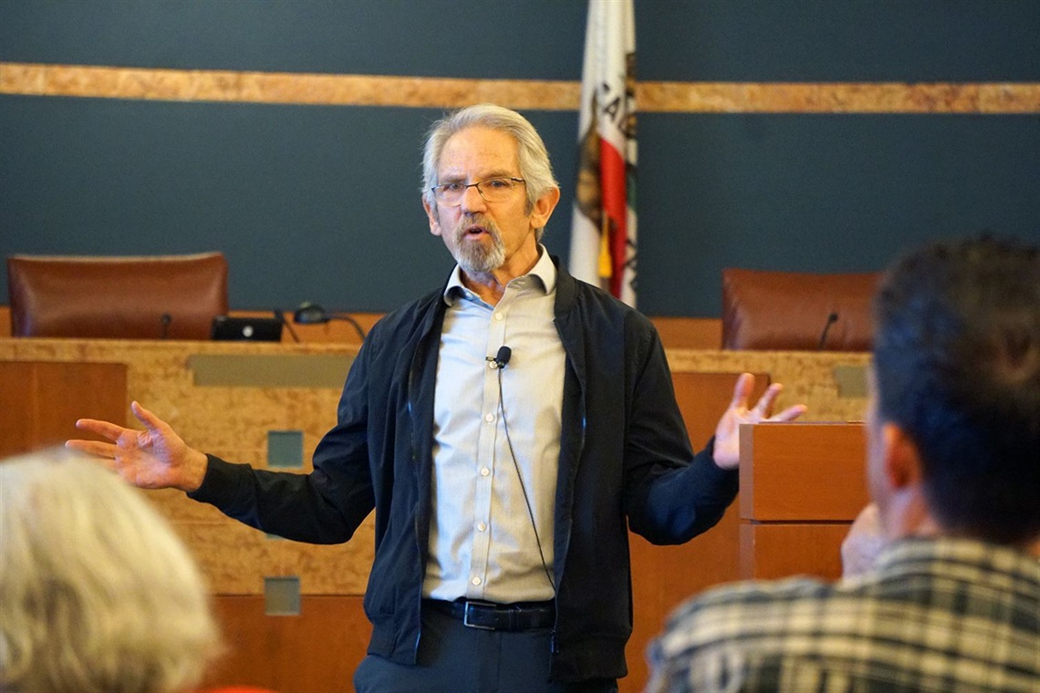Dr. Stuart Gabriel speaks to crowd about affordable housing solutions.