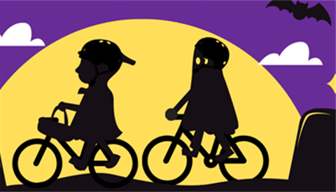 graphic of two kids on bikes in Halloween costume with a full moon and bat in the background