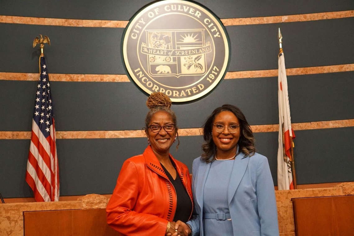 Mayor McMorrin and LA Supervisor Holly J. Mitchell pose for photo.