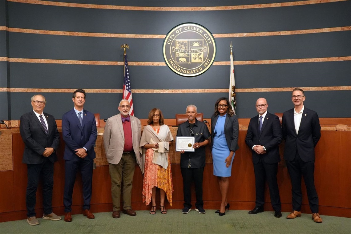 Photo of staff from Realty Executives Westside with City Council