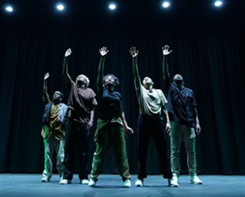 Five dancers on stage