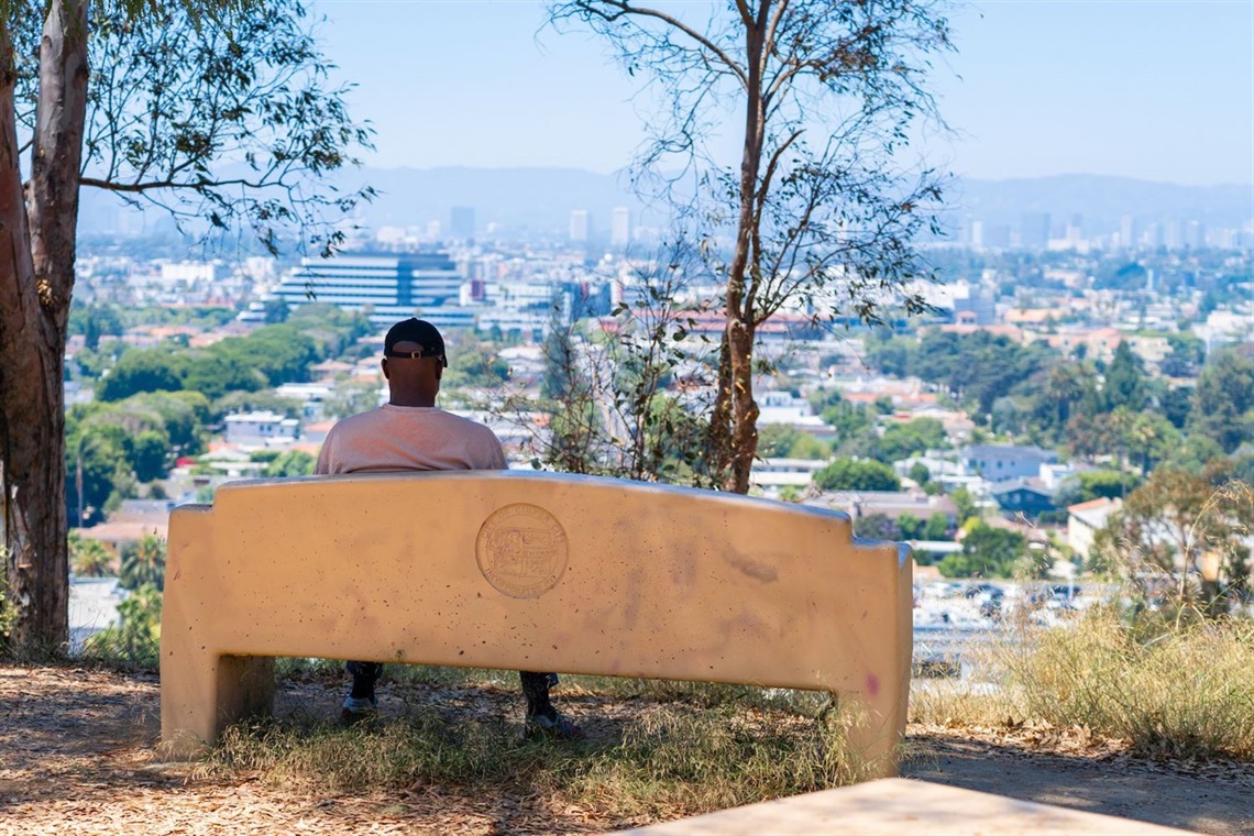 Photo of Culver City skyline with man sitting on bench.jpg