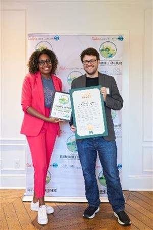 Photograph of Mayor Yasmine-Imani McMorrin celebrating Sustainability Award with Kirk Douglas Theatre