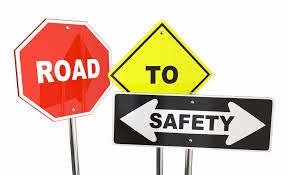 Image of three road signs that read 