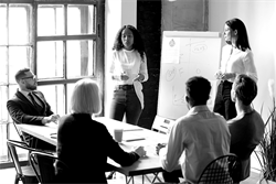 two women conducting a meeting 