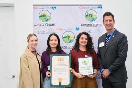 Photograph of Mayor Dan O'Brien presenting OFFICEUNTITLED with 2025 Sustainable Business Certification Award 2025-09-23