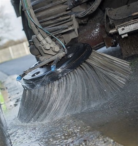 Photograph of street sweeper.